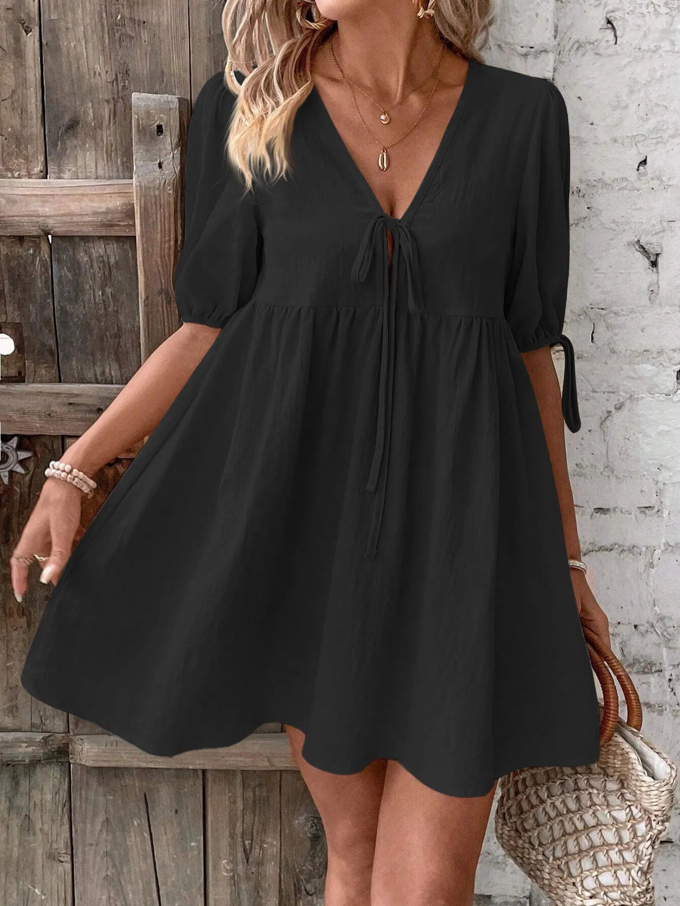 V-Neck Tie-Front Mini Dress with Puff Sleeves designed for comfort and style at Lookzlike