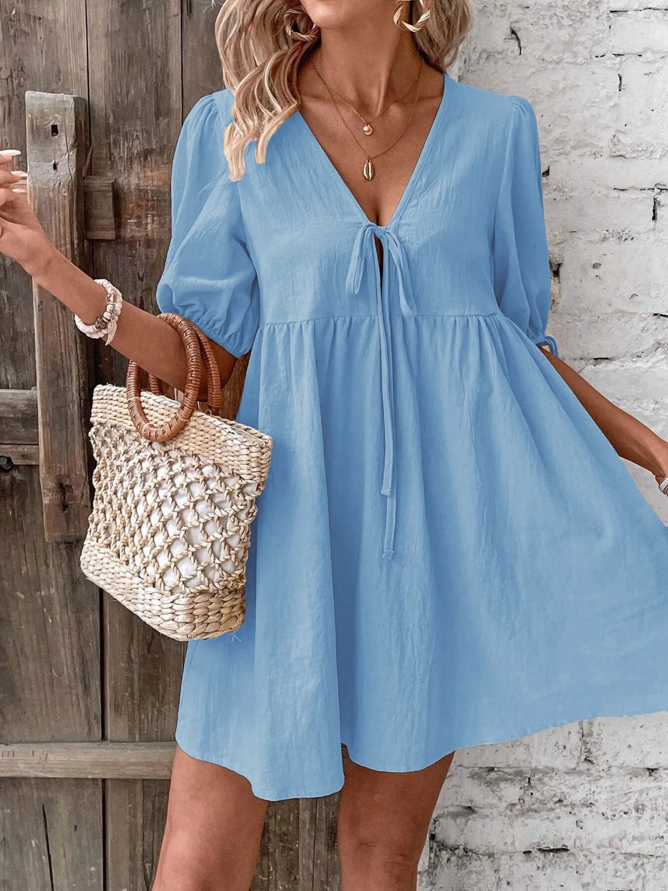 V-Neck Tie-Front Mini Dress with Puff Sleeves designed for comfort and style at Lookzlike