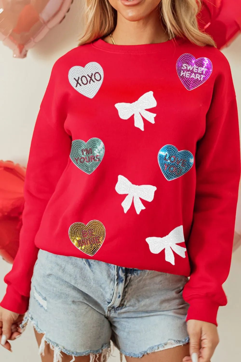 Valentine’s Day Sequin Bow Heart Round Neck Sweatshirt designed for comfort and style at Lookzlike