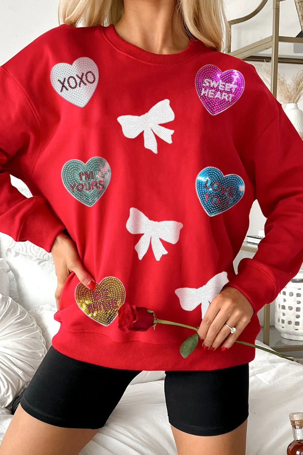 Valentine’s Day Sequin Bow Heart Round Neck Sweatshirt designed for comfort and style at Lookzlike