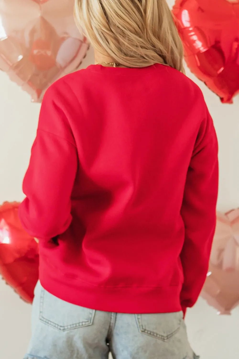 Valentine’s Day Sequin Bow Heart Round Neck Sweatshirt designed for comfort and style at Lookzlike