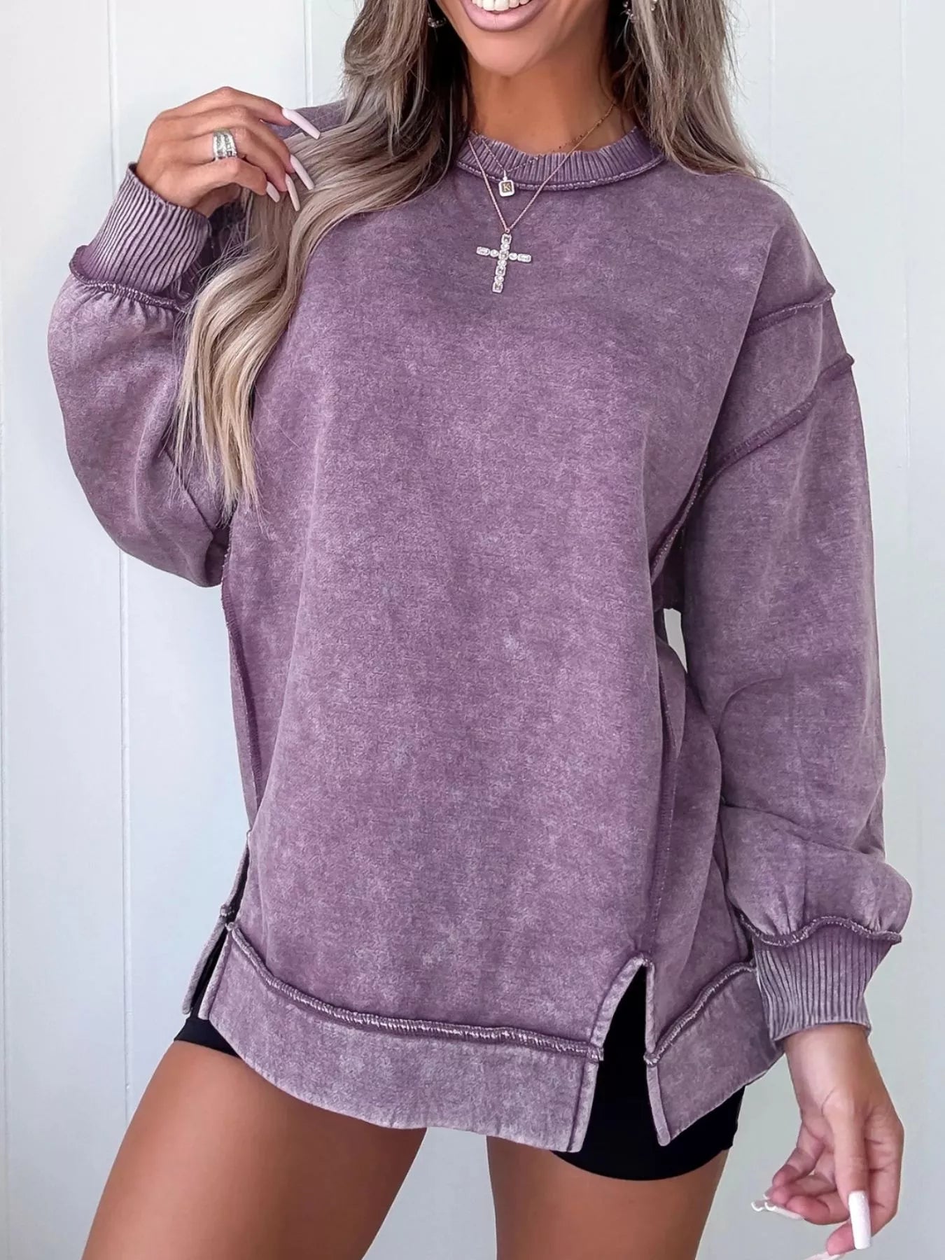 Wash Slit Round Neck Oversized Sweatshirt designed for comfort and style at Lookzlike