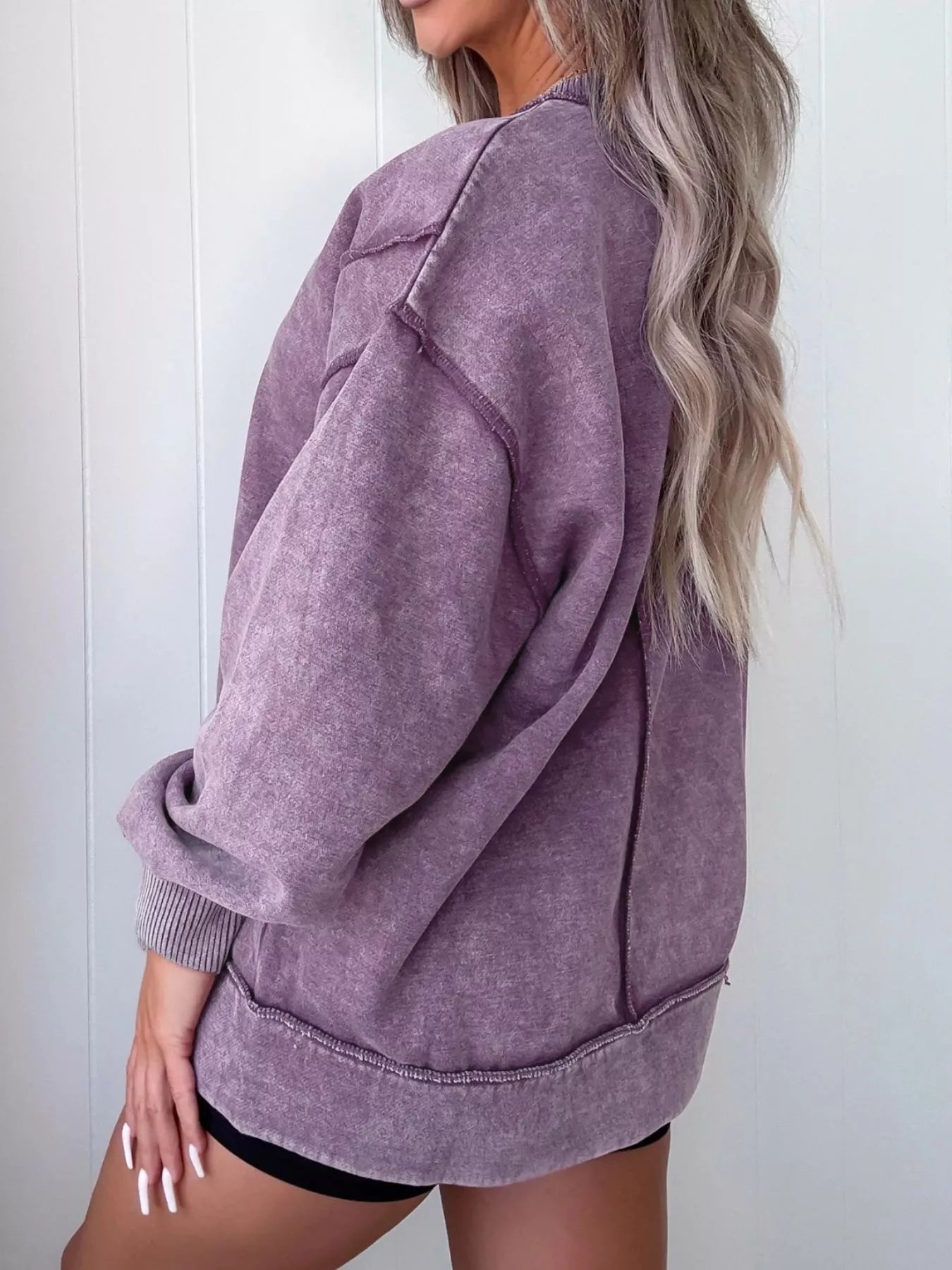 Wash Slit Round Neck Oversized Sweatshirt designed for comfort and style at Lookzlike