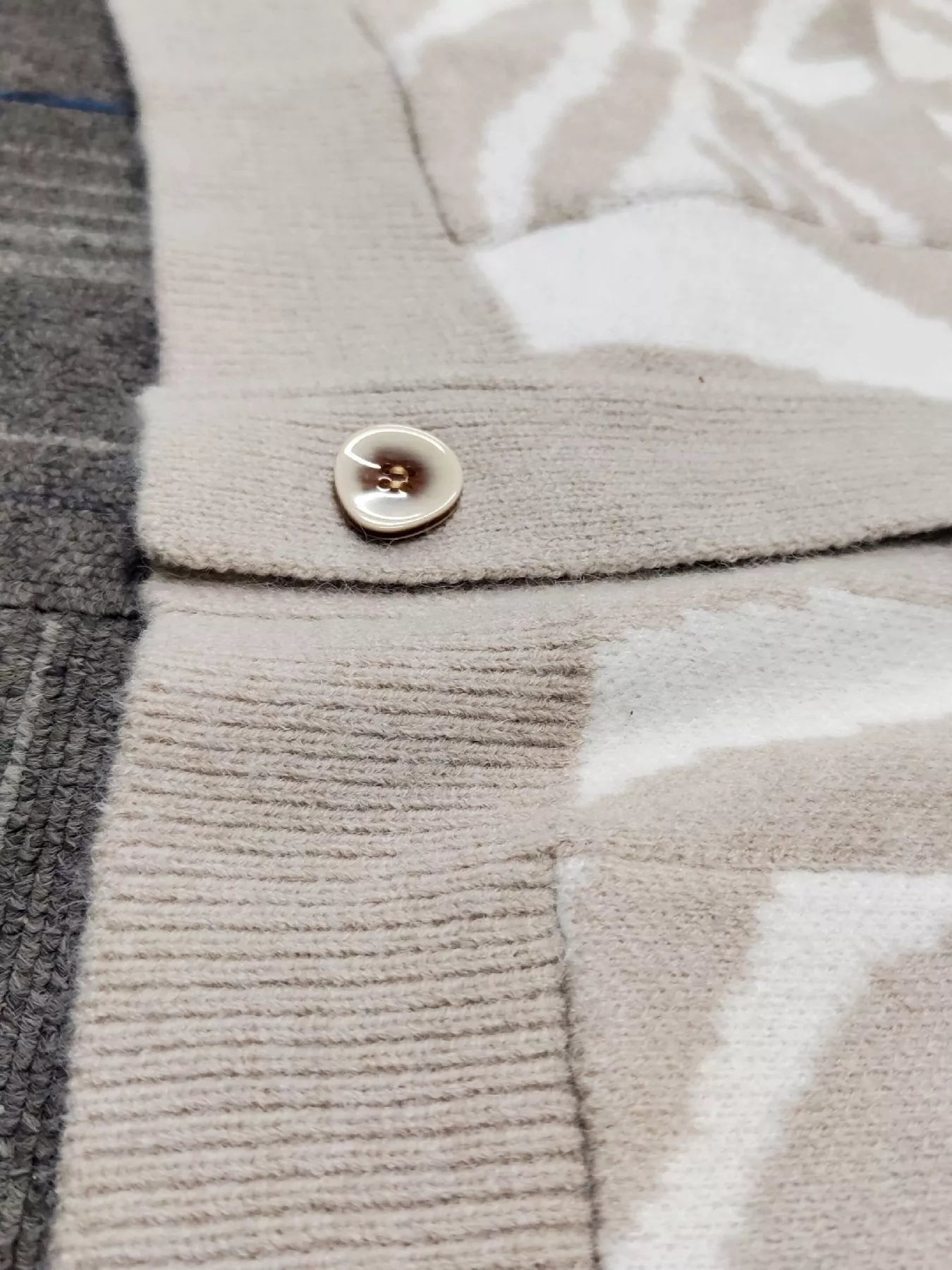 Zebra Print Button Up Cardigan designed for comfort and style at Lookzlike